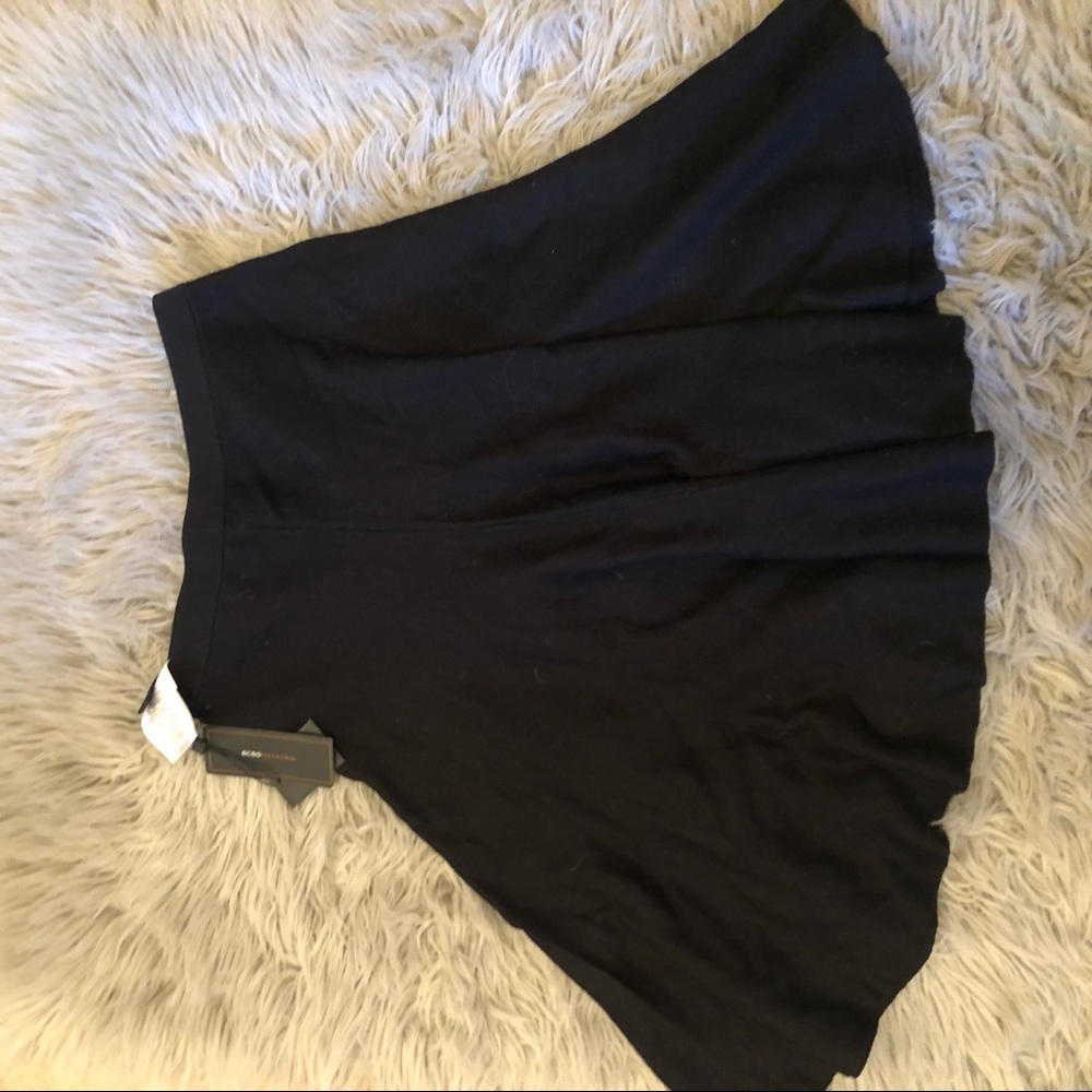 Black A-line skirt.